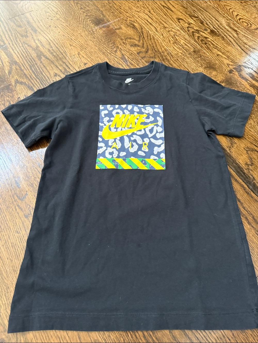 Nike Black Short Sleeve Tee with Yellow Logo and Blue Graphic